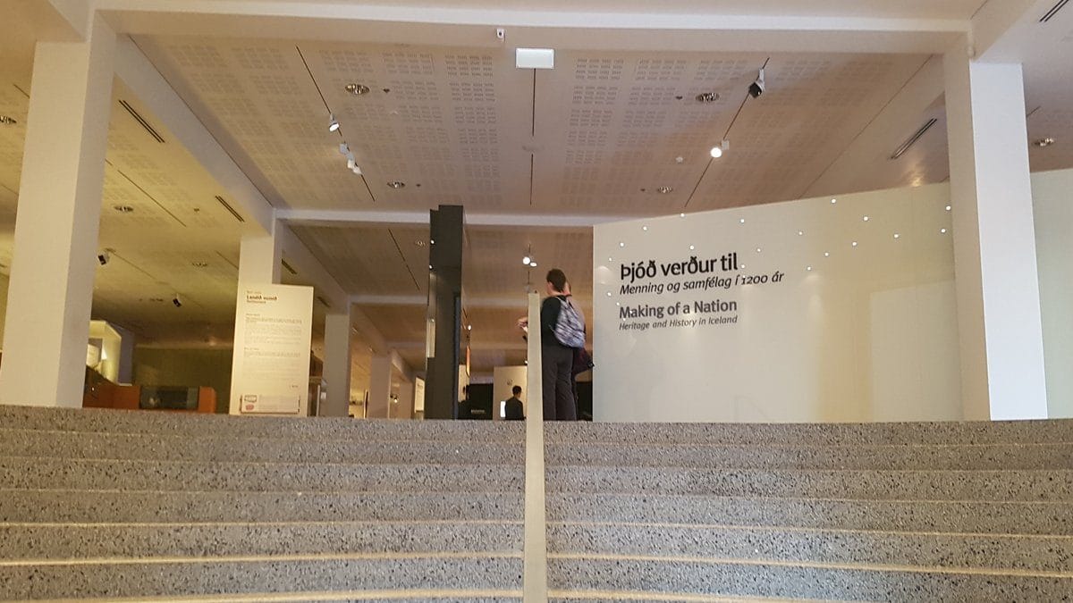 Steps in an arc leading up to the display level at the entrance to the Making of a Nation permanent exhibition in the National Museum of Iceland.