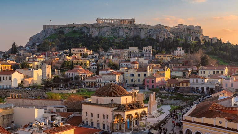 Looking onto the Acropolis over the Plaka District in Athens at sunset.